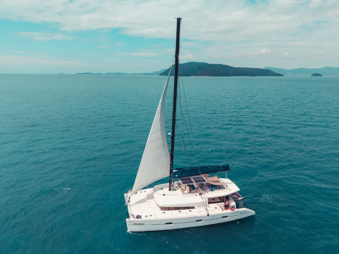 Aerial view of the Catalante sailing catamaran on the water.