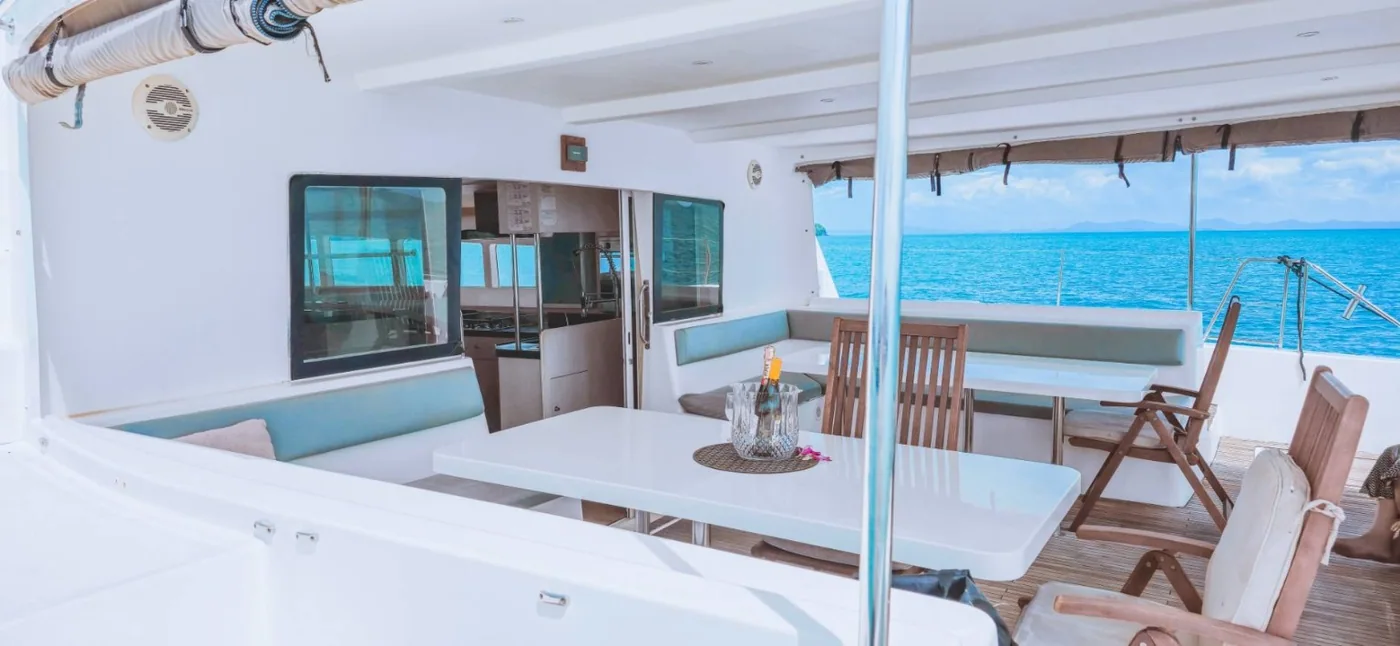 Aft deck seating and dining area aboard the Catalante.